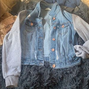 Denim jacket with sweater sleeves